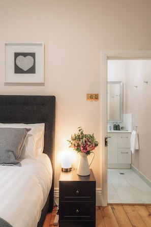 Deluxe Double Room, 1 Queen Bed | Bathroom | Shower, hair dryer, slippers, towels