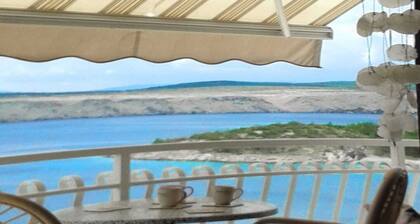 House with sea view above the beach