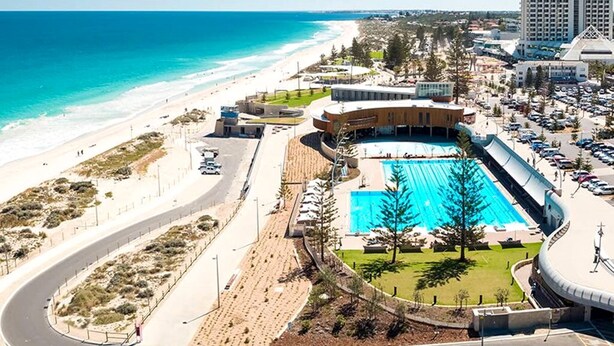 A coastal hotel with a swimming pool, beach access, and a parking area. - Master retreat at Private Estate Near Perth CBD (Stirling)