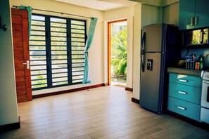 Fridge, microwave, stovetop, coffee/tea maker