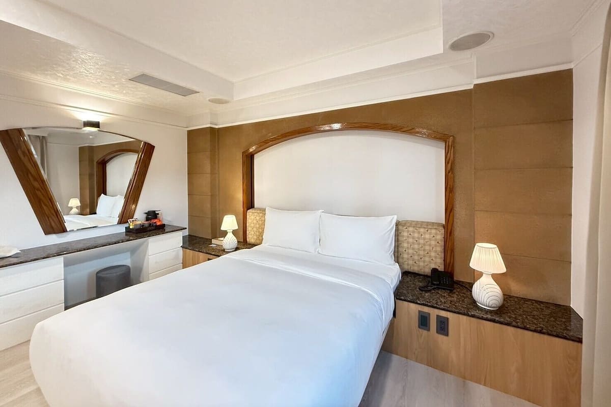 Basic Double Room, City View | Blackout drapes, iron/ironing board, free WiFi