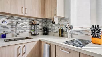 Microwave, coffee/tea maker, cookware/dishes/utensils