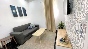 Comfort Apartment, Balcony, Beach View | Ruang tamu