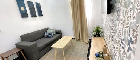 Comfort Apartment, Balcony, Beach View | Living area