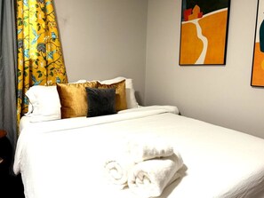 1 bedroom, desk, iron/ironing board, travel cot