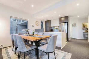 Dining - PS®5 plus TV in bedrooms and work-from-home setup (Docklands)