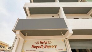 A multi-story building with a sign for 'Hotel Magadh Regency' at the bottom. - HOTEL MAGADH REGENCY (Patna)