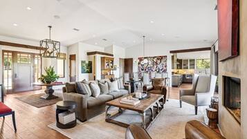 TV, fireplace, books, stereo