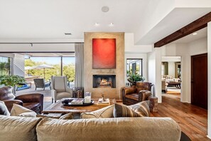 TV, fireplace, books, stereo