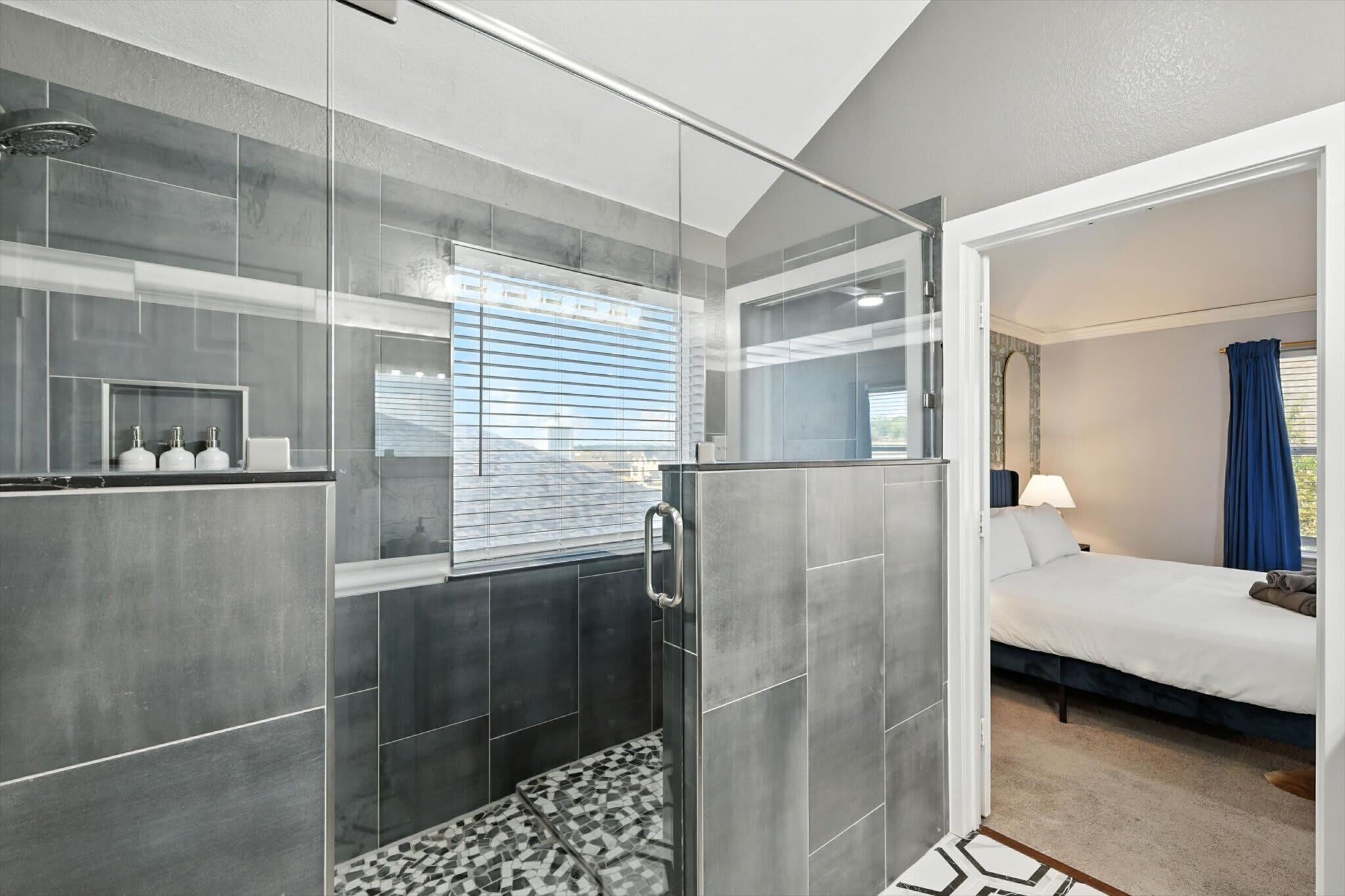 Shower, hair dryer, towels, shampoo