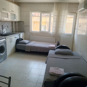 Desk, blackout drapes, iron/ironing board, WiFi (free)