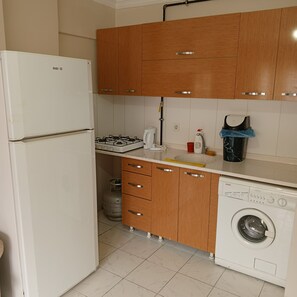 Departamento, balcón, vista a la ciudad | Cocina privada