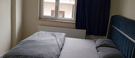Apartment, Balcony, City View | Blackout drapes, iron/ironing board, free WiFi