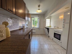Apartment | Private kitchen | Highchair, cookware/dishes/utensils, cleaning supplies