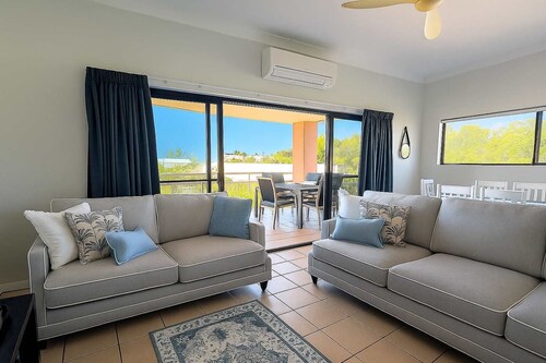 Steps to The Strand 2BR Apt with Pool, Castle Hill Views