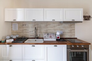 Private kitchen - Apartments with pool between Nature and Relaxation in the heart of Tuscia (Lazio)