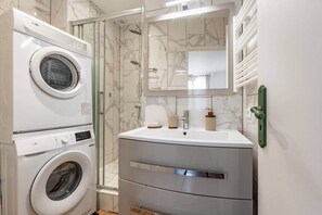 Hair dryer, towels, soap, toilet paper