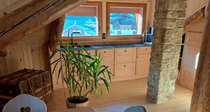 Gorgeous wooden attic room with wonderful view of Lake Auronzo