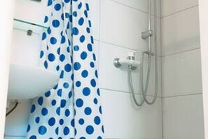 Shower, hair dryer, soap, shampoo