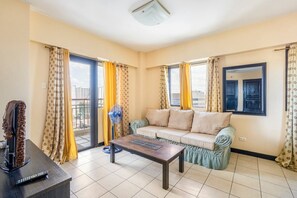 Condo, 2 Bedrooms, Accessible, Balcony | Living room - Lovely Skyview Haven -near BGC (Taguig)