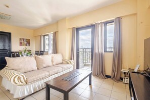 Condo, 2 Bedrooms, Accessible, Balcony | Living room - Lovely Skyview Haven -near BGC (Taguig)