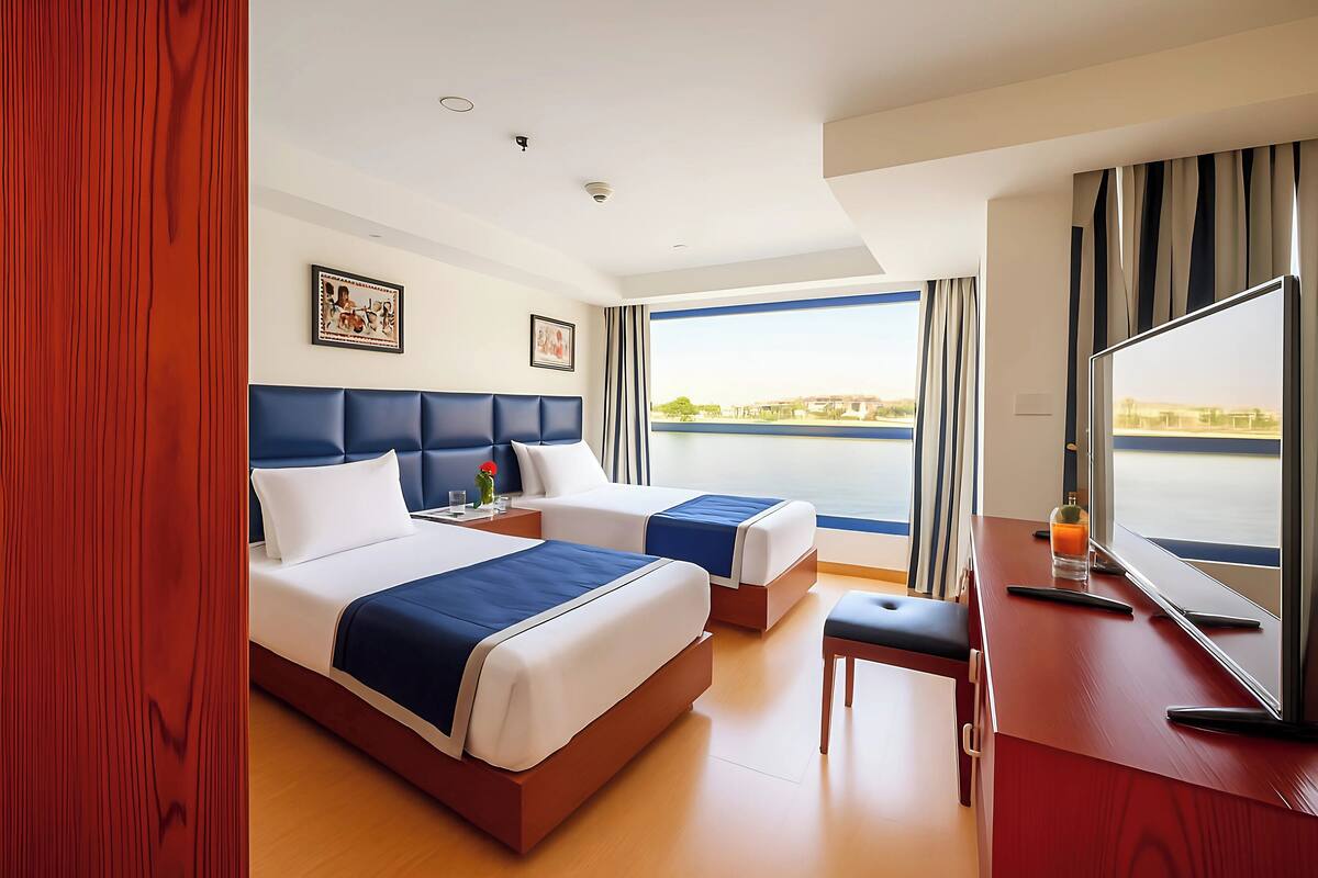Deluxe Suite, Balcony, River View | Langsir/tirai gelap terus, kalis bunyi