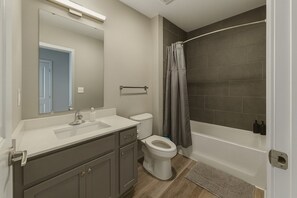 Hair dryer, towels, soap, toilet paper