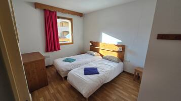 2 habitaciones y ropa de cama