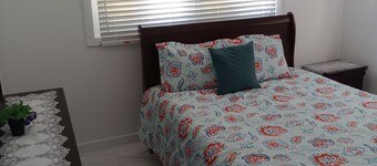 Charming unit 1 & 2-  2 bedroom apartment in cool Rock Sound with AC