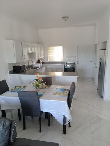 Charming unit 2 -----  2 bedroom apartment in cool Rock Sound with AC