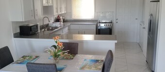 Charming unit 2 ----- 2 bedroom apartment in cool Rock Sound with AC