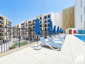 Outdoor pool - Stylish RAK Studio Balcony, Pool & Fitness (Dubai)