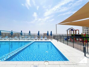Outdoor pool - Stylish RAK Studio Balcony, Pool & Fitness (Dubai)