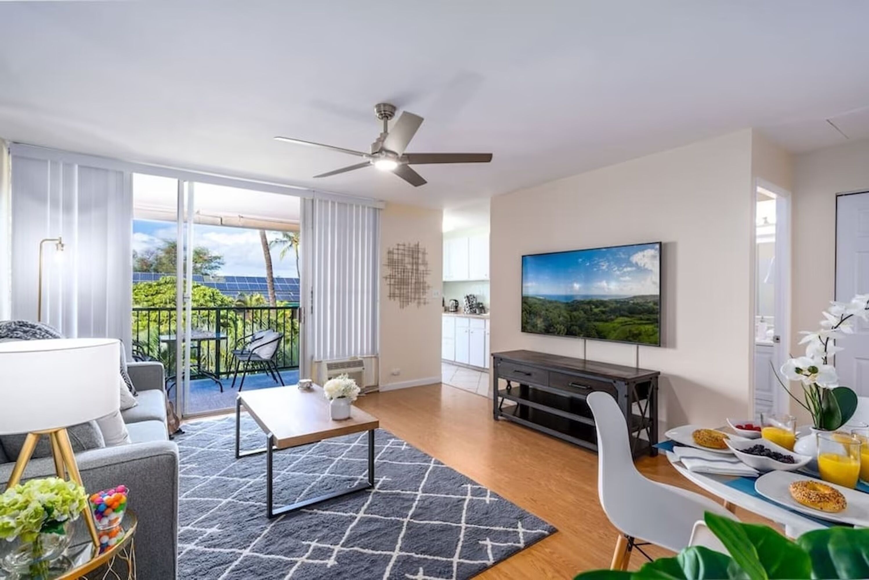 Comfort Condo, Balcony, Ocean View | Living area | 65-inch Smart TV with digital channels