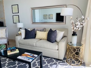 Elite Apartment, Balcony, Ocean View | Living area | 65-inch Smart TV with satellite channels, Netflix, streaming services - The Ocean View Residence (Kihei)