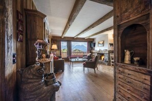 TV, fireplace, books, stereo
