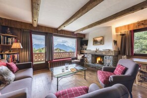 TV, fireplace, books, stereo