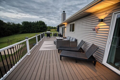 Modern Lake Retreat with Hot Tub, Game Room & Two-Tier Deck