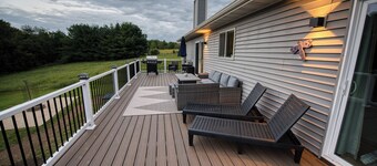 Modern Lake Retreat with Hot Tub, Game Room & Two-Tier Deck