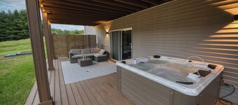 Modern Lake Retreat with Hot Tub, Game Room & Two-Tier Deck