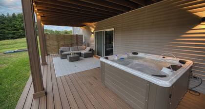 Modern Lake Retreat with Hot Tub, Game Room & Two-Tier Deck