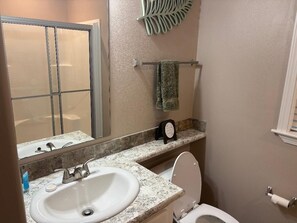 Shower, hair dryer, towels, soap