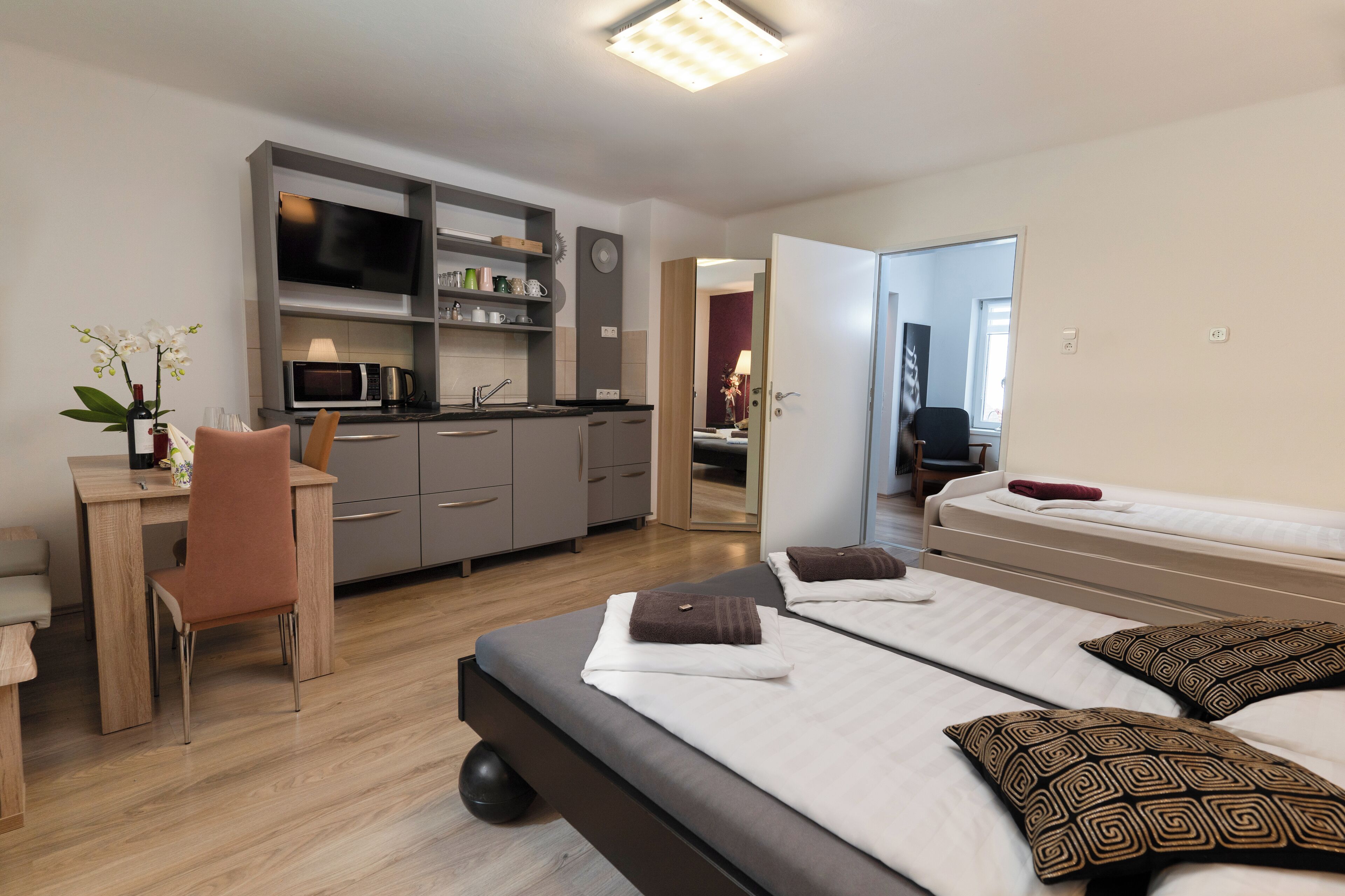 Family Apartment, Garden View | In-room safe, free WiFi