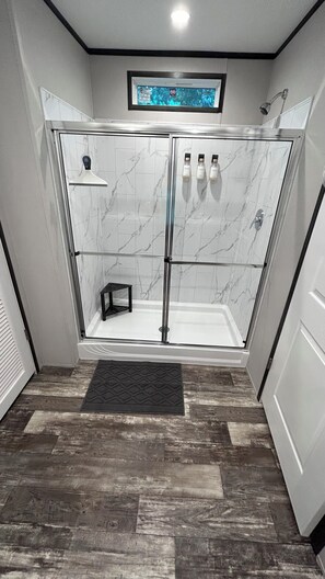 Shower, towels, soap, shampoo