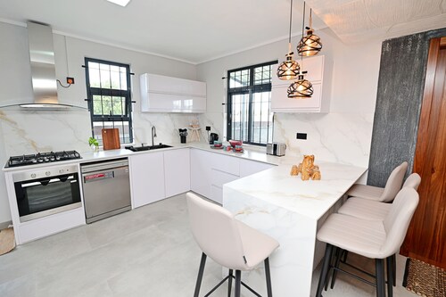 Smart & Modern 2BR Home in Secure Gated Area