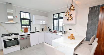 Smart & Modern 2BR Home in Secure Gated Area