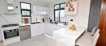 Smart & Modern 2BR Home in Secure Gated Area