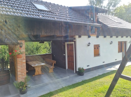 Outdoor dining. Holiday Home Katica - Two-Bedroom Holiday Home