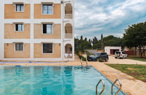 Modern 2-Bedroom Beachside Apartment in Diani, Modern + Swahili Touch