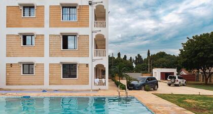 Modern 2-Bedroom Beachside Apartment in Diani, Modern + Swahili Touch